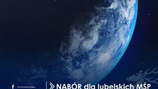 granatowe tło, kula ziemska, opis : Nabór dla lubelskich MŚP
